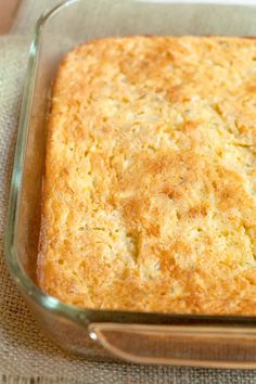 a casserole dish with some type of food in it on a table cloth