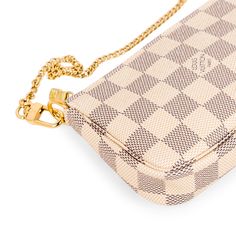 The Pochette is a petite accessory perfect to add to your Louis Vuitton day bag or simply wear it by itself if you only need a few items! The Pochette comes in the iconic Louis Vuitton damier Azur print recognisable anywhere. The gold chain that is attached as the top handle also detaches from one side, enabling you to hook it onto other accessories. Style your mini Pochette with your Louis Vuitton day bag. SPL Exterior Damier Azur Canvas Gold toned hardware Gold chain detachable from one side Z Louis Vuitton Mini Pochette, Things I Need To Buy, Line Branding, Accessories Style, Louis Vuitton Damier Azur, Abayas Fashion, Brown Canvas, Day Bag, Diaper Backpack