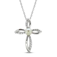 A classic round freshwater pearl graces the center of this beautiful cross necklace for her. Sparkling white lab-created sapphires swirl above, below and either side of the sterling silver pendant. The pendant sways from an 18-inch cable chain and secures with a lobster clasp. Sterling Silver Cross Necklace, White Lab, Beautiful Cross, Necklace For Her, Accessories Jewelry Necklace, Necklace Sterling Silver, Cultured Pearls, Sterling Silver Pendant, Cable Chain