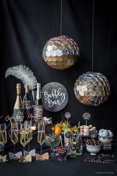 a table topped with lots of bottles and glasses