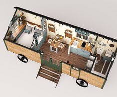 an overhead view of a tiny house with stairs