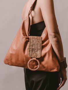 Elevate your style with this Chic Bohemian hobo bag. Made of genuine goat leather, it's perfect for any occasion. Features a wide shoulder strap and beaded flap closure. Stay organized with interior slip and zipper pockets. Don't forget to pair it with our beaded shoes for a charming look! -Measurements: Bottom length 39cm, height 37cm-Measurements (inch): length 15.3", height 10.5"-Shoulder drop 33cm (13")-Zip closure / flap-Inside zip pocket & open pocket-Matching cotton drill lining Bohemian Style Bag, Beaded Shoes, Large Leather Bag, Bohemian Skirt, Night Day, Soft Leather Bag, Bohemian Bags, Hippie Bags, Chic Bohemian