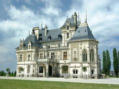 an old castle like building with many windows