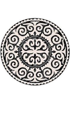 a black and white plate with an intricate design