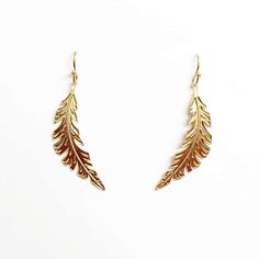 Hulu ʻekekeu is the Hawaiian word for feather. Our light-weight, whimsical feather earrings are 14k gold or silver plated on brass. Length: 1.25" Designed & made by Leighton Lam Designs in Hawaii. Metal Feather, Hawaii Usa, Feather Earrings, Gold Earrings, Silver Plate, Silver Plated, Hawaii, Plating, Brass