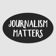 a black oval sticker with the words journalist matters on it, in white lettering