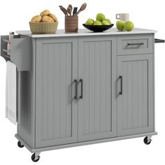 a gray kitchen cart with two baskets on top and one bowl of fruit sitting on top