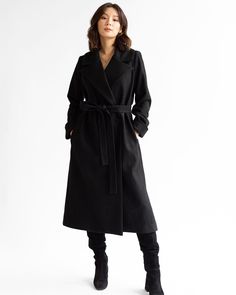 Timeless Long Black Wool Overcoat with a modern twist. Proudly Made in the USA from 100% RWS certified + NATIVA Regen™ domestic wool. Ethically sewn in Chicago, IL. Recommended for temperatures ranging from 5 to 35 degrees Fahrenheit. Fully lined for warmth and quality. Combines style and sustainability. Double back walking vent for mobility. On-seam belt vents for versatile styling options. Deep on-seam pockets for carrying essentials. Single horn snap closure reinforced with magnetic closures Tailored Black Wool Long Coat, Modern Black Wool Long Sleeve Coat, Modern Black Wool Coat With Long Sleeves, Modern Black Long Sleeve Wool Coat, Modern Tailored Black Wool Coat, Modern Black Wool Coat, Modern Black Wool Coat For Fall, Modern Long Black Pea Coat, Modern Black Long Pea Coat