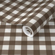 a brown and white checkered table cloth