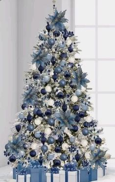 a christmas tree with blue and white ornaments