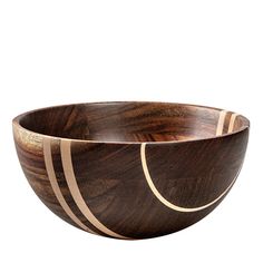 a wooden bowl with gold lines on it