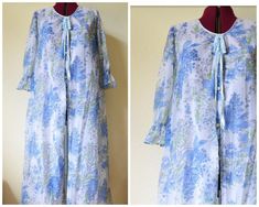 Vintage 1970's negligee / brunch coat ~ super sweet original vintage robe/dressing gown in semi sheer nylon with large blue floral pattern, sweet half sleeves with ruffle details, buttons all the way down and a ribbon tie at the neck. Honestly wear it as a dress, it's that cool! MATERIAL nylon CONDITION excellent! SIZE Fits a range of sizes from small to large, it is marked 12-34 which may mean it's intended for a 34 inch bust  MEASUREMENTS Taken across lying flat (double for circumference) unde Priscilla Presley, Floral Robes, Pajama Robe, Womens Robes, Dressing Gown, Ribbon Tie, Super Sweet, Half Sleeves, Blue Floral