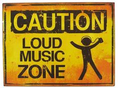 a yellow caution sign that says loud music zone