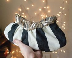 Handmade and completely one-of-a-kind.  Free shipping within the USA. #circus #bigtop #fashion Sequin Clutch, Striped Fabric, Striped Fabrics, White Fabric, White Fabrics, Spectacles, On Earth