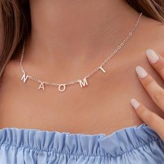 Personalized necklace * Name necklace * Initial necklace * Women's jewelry * Gift * Material: high quality solid silver * Dimension: letter height of 7mm * Finish: Silver ∙ Gold ∙ Rose Gold * All our jewelry is custom made by hand in our workshop 🛍️ C O M M E N T ∙ C O M M A N D E R 🛍️ * Just use "PERSONALIZATION" to let us know the NAME / LETTERS / SYMBOLS you want (Up to 7 characters). 💎 YOUR CUSTOMIZATION 💎 * Design will be in all caps unless otherwise noted. 📃 I N F O R M A T I O N S 📃 Silver Initial Necklace With Clavicle Chain For Anniversary, Silver Initial Pendant Necklace For Mom, Silver Dainty Initial Necklace With Clavicle Chain, Silver Sterling Silver Name Necklace With Initials, Silver Initial Necklace With Name, Dainty Silver Initial Necklace With Clavicle Chain, Personalized Silver Initial Pendant Necklace, Silver Sterling Silver Initials Name Necklace, Sterling Silver Necklace With Custom Name In Silver