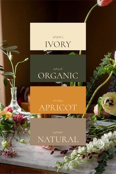 an arrangement of flowers and plants on a table with the words organic apricot next to it