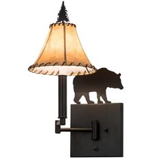 the bear lamp is mounted on the wall