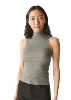 Elevate your style with our Lino Mock Neck Tank in Granite! Featuring a mock neck design and a body-skimming fit, this sleeveless top is perfect for any occasion. Wear it alone for a fun party look or layer it under a blazer for a touch of sparkle. Feel confident and chic in this must-have addition to your wardrobe. One Size-runs like a small/medium Mock Neck Tank, Party Look, Michael Stars, Party Looks, Small Tops, Feel Confident, Best Part Of Me, Neck Designs, Occasion Wear