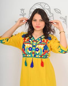 This embroidered dress is as classy as it gets! It is an extremely comfortable wear, light and soft, and can be used on many occasions - home gatherings, festival parties, summer occasions, dinners, or just in your home to feel comfortable. Fabric: 80% Egyptian Cotton; 20% Polyester. Kaftan measurements in inches : Medium (Size 8/10 USA) Bust: 39-40 Hip: 45-46 Large (Size 12/14 USA) Bust: 44-45 Hip: 50-51 XL (Size 16/18 USA) Bust: 47-48 Hip: 53-54 XXL (Size 20/22 USA) Bust: 49-50 Hip: 55-56 >> Shipping times<< We ship all orders with DHL or UPS Express within one to two business days. Delivery times to the USA and Europe are 3 to 5 days from the date of shipping. On average, you should receive your order within 4 to 7 days from the day you place the order. >> Refunds, returns, and exchange Spring Bollywood Kaftan With Dabka Work, Bollywood Style Spring Kaftan With Dabka Work, Bollywood Style Dabka Work Kaftan For Spring, Summer Kaftan With Dabka Work, Summer Anarkali Kaftan, Yellow Chikankari Embroidery Kaftan, Multicolor Embroidered Kaftan With Dabka Work, Traditional Maxi Dress With Multicolor Embroidery, Traditional Multicolor Embroidered Maxi Dress