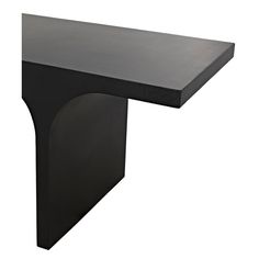 a black table sitting on top of a white floor