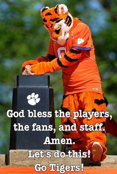 a person dressed in an orange tiger costume with the words, god bless the players, the fans, and staff amen let's do this go tigers