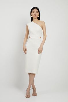 Elegantly Sculpting The Silhouette With Italian Structured Stretch, This Piece Features A One Shoulder Design Wit Waist Cut Out Detailing For An Elevated Touch. Finished With A Midi Length, Pair With Bold Heels And Accessories For Stand-Out Occasions.One Shoulderpencil Dresscut Out Details Hen Do Outfits, Bold Heels, Ivory Cocktail Dress, Outfits For Mexico, Spring Wedding Guest Dress, Petite Business Casual, Ibiza Outfits, Italian Dress, Fall Wedding Guest Dress