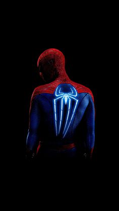 the amazing spider - man movie poster is shown in blue and red light up clothes