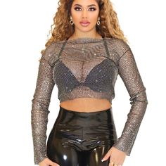 Guida Sheer Long Sleeve Rhinestone Net Embellished Top This Sheer Long Sleeve Top Will Steal The Center Stage With Its Rhinestone-Embellished Net Composition. Complete With A Boat Neckline, Long Sleeves, And A Waist-Length Silhouette, Style This Top With Leather Pants And Black Pumps. Don’t Forget A Swipe Of Red Lipstick! Sheer Long Sleeve With Rhinestones 50% Nylon, 50% Glass Color: Black Sizes: S (0-2), M (4-6), L (8-10) Red Velvet Top, Sheer Long Sleeve Top, Sheer Long Sleeve, Embellished Top, Red Lipstick, Glass Color, Velvet Tops, Boat Neckline, Center Stage