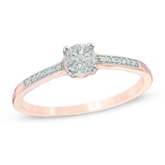 a rose gold ring with an oval cut diamond