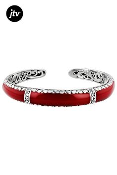 Indulge in the beauty of our Artisan Collection of Bali��� Red Coral Inlay Sterling Silver Cuff Bracelet. This exquisite piece boasts a striking red coral inlay that adds a pop of color to any outfit, complemented by the intricate oxidized finishing technique which gives it an air of vintage charm. The bracelet is crafted from high-quality sterling silver and measures 6.75 inches in length with a width of 0.41 inches, making it perfect for adding flair to your wrist without being overwhelming.  Whether you're dressing up for a night out or simply want to elevate your everyday look, this Red Coral Inlay Sterling Silver Cuff Bracelet will be sure to turn heads wherever you go! Elegant Adjustable Red Coral Bracelet, Elegant Red Coral Adjustable Bracelet, Elegant Red Bangle Bracelets, Elegant Red Bangle Bracelet, Elegant Red Adjustable Bangle, Traditional Red Cuff Bracelet As Gift, Luxury Red Cuff Bracelet As Gift, Luxury Red Cuff Bracelet For Gift, Elegant Red Bangle For Formal Occasions