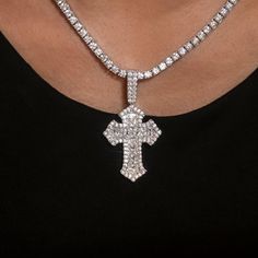 Introducing the Diamond Gothic Cross Pendant in 14k White Gold. This exclusive piece is fully iced out with hand-set stones in a detailed gothic cross design that will instantly elevate your look. Perfect for any occasion, this cross is a timeless symbol of faith and style. Pair it with the 3mm Diamond Tennis Necklace for a set that is guaranteed to shine! This product is guaranteed for life - GLD will repair the item should you experience any defects in craftsmanship or breakage. Specifications Gothic Cross, Gothic Crosses, Diamond Tennis Necklace, Tennis Necklace, Vermeil Jewelry, Cross Design, Custom Earrings, Cross Designs, Elevate Your Look