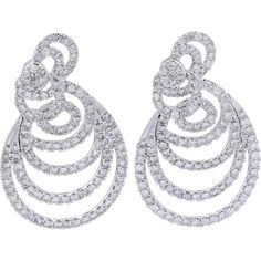 Embrace the elegance of timeless sophistication with the 14K White Gold 7 Carat Total Weight Diamond Spiral Statement Earrings.Crafted to capture attention and ignite admiration, these earrings exude opulence and grace. Each dazzling diamond, totaling an impressive 7 carats, is meticulously set within a captivating spiral design, creating an aura of luxury and allure. The brilliance of the diamonds is further enhanced by the luminosity of the 14K white gold, adding a touch of glamour to any ensemble.These statement earrings are more than just accessories; they are symbols of refined taste and unmatched beauty. Whether worn for a special occasion or to elevate everyday glamour, they effortlessly exude confidence and sophistication. Let these exquisite earrings be a testament to your impecca Luxury White Gold Diamond Chandelier Earrings, Luxury Art Deco White Gold Diamond Earrings, Elegant Spiral Jewelry For Formal Occasions, Elegant White Gold Spiral Earrings, Elegant Spiral Jewelry With Diamond Accents, Elegant Swirl Earrings, Classic Spiral Jewelry For Formal Occasions, Formal Spiral Diamond Jewelry, Formal Spiral Jewelry With Matching Earrings