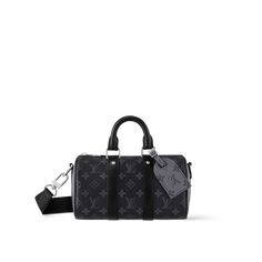 LOUIS VUITTON® - Keepall Bandoulière 25 - Monogram Eclipse Reverse Luxury Gifts For Men, Spring Sandals, Louis Vuitton Keepall, Louis Vuitton Official, Wallet Pouch, Monogram Bag, Messenger Bag Men, City Bag, Vuitton Bag