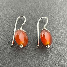 Vintage Carnelian Sterling Silver Fancy Drop Earrings, Stamped 925, Max Drop Length 27.5mm, Max Width 12mm, Total Weight 3.96 Grams, Secure Ear Wire, Lovely Condition Amber Carnelian Earrings With Ear Wire, Round Orange Carnelian Earrings, Orange Carnelian Round Earrings, Carnelian Amber Earrings For Gift, Amber Carnelian Earrings Gift, Round Carnelian Gemstone Earrings, Carnelian Gemstone Round Earrings, Carnelian Round Earrings With Ear Wire, Silver Carnelian Earrings For Gift