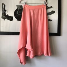 Suncoo Fleur Midi Skirt In Rose....Size T1 Or S. Ruffled Asymmetric Midi Skit Ruffled Midi Skirt, Asymmetric On The Side, Fluid Fabric In Cupro And Lyocell, Zippered Closing On The Side, Waistband. Flowing Slinky Matte Satin; 60% Cupro, 40% Lyocell. Waist Across 13.25". Length 23" At Shortest And 36" At Longest. New With Tag. C Fitted Asymmetrical Wrap Skirt For Brunch, Spring Flowy Skirt With Asymmetrical Hem, Asymmetrical Wrap Skirt For Brunch, Spring Draped Skirt With Asymmetrical Hem And Lining, Spring Asymmetrical Hem Draped Skirt, Asymmetrical Wrap Skirt With Lining For Brunch, Asymmetrical Lined Wrap Skirt For Brunch, Fitted Asymmetrical Wrap Skirt For Summer, Summer Asymmetrical Maxi Skirt With Lining