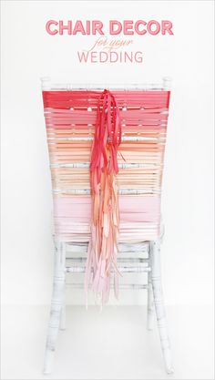 a chair decorated with red and pink ribbons