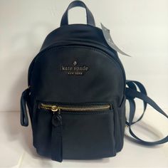 Nwt. Kate Spade Chelsea Mini Backpack. Small Nylon Mini Backpack. Measurements: 7.2" W X 9.8" H X 4" D, Strap Drop: 1.5", Handle Drop: 2.3" Features Metal Pinmount Logo Closure Type: Zip Around Closure Interior: Back Slip Pocket Exterior: Front Zip Pocket, Side Slip Pockets 100% Recycled Nylon Trim: Smooth Pvc Trim Lining: 100% Recycled Polyester Lining Imported Style Number Kc524 Kate Spade Backpack With Zipper Closure, Kate Spade Nylon Bag With Zipper Closure, Kate Spade Backpack, Minnie Mouse Backpack, Cute Mini Backpacks, Flap Backpack, Medium Backpack, Small Backpack, Canvas Backpack