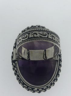 Large genuine amethyst Vintage ring Low content silver not sterling. Size 8 Can be resized by my jeweler for $15-$20 All rings are shipped free in the US in a nice gift box. Check out our over a THOUSAND great reviews Engraving is $4 per letter and is not always perfect depending on the piece. It can take a few days if the jeweler is busy. This is payable to Paypal Judithsltd@gmail.com Silver Amethyst Cabochon Ring For Anniversary, Purple Hallmarked Amethyst Ring For Gift, Antique Purple Rings As Gift, Cabochon Amethyst Ring Gift, Gift Amethyst Ring Hallmarked, Antique Purple Rings For Gift, Nickel-free Purple Rings For Jewelry Making, Unique Silver Oval Amethyst Ring, Spiritual Oval Amethyst Ring With Stone Setting