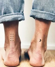 two people with small tattoos on their feet and one has the words have no time to sit