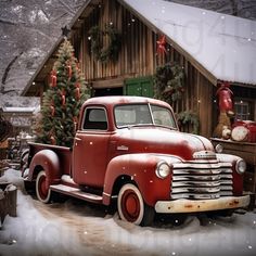 an old red truck is parked in front of a barn with christmas decorations on it