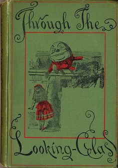 an old children's book with the title through the looking - glass on it