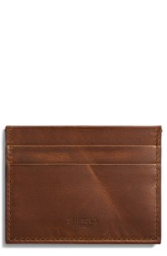 Slim and sleek, this Italian-leather case features five slots to keep your cards organized in handsome style. 4"W x 3"H Leather Made in Italy Classic Cognac Bifold Card Holder, Brown Business Card Holder With Interior Slots, Classic Brown Card Holder With Coin Pocket, Classic Cognac Wallet With Interior Card Slots, Brown Rfid Blocking Card Holder For Business, Brown Rectangular Card Holder For Business, Classic Cognac Wallets With Smooth Grain, Classic Cognac Wallet With Smooth Grain, Classic Leather Card Holder With Coin Pocket