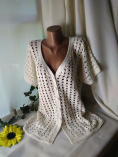 Hand-knitting Loose V Neck button-down cardigan. White mesh top summer festival boho ladies' blouse. Sleeve soft jacket tunic.  Ready to ship The sweater circumference chest is 92-96cm(36.2"- 37.8" inches), the length is 70cm(27.5"), sleeve length 15cm(6"). Chest circumference and length of the cardigan custom order. Washing delicately. Bohemian V-neck Knitted Top, Bohemian Knitted V-neck Top, Fitted Bohemian V-neck Sweater, Bohemian V-neck Knit Cardigan, Bohemian Knit V-neck Cardigan, Bohemian Blouse With Buttons For The Beach, Bohemian Beach Blouse With Buttons, Bohemian V-neck Summer Sweater, Spring Open Knit Blouse