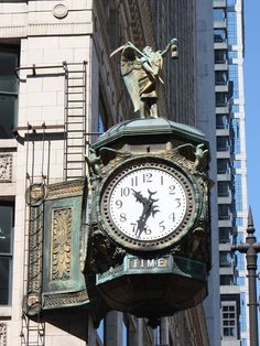 a large clock on the side of a building