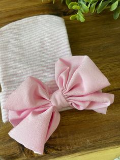 Welcome to The Tiny Blessings Boutique!  This listing is for our soft newborn hats -they are perfect for your new little bundle! They fit your little one's head snug and keep them warm.  A bow is added for just the perfect girly touch!  Make sure to follow us on social media and share photos of your little sweetie wearing TBB to win a $25 gift card from our monthly drawing! Facebook: www.facebook.com/thetinyblessingsboutique Instagram: @tinyblessingsboutique Thanks for looking and have a great d Cute Soft Pink Hat, Cute Soft Hats For Gifts, Cute Soft Hats Perfect As Gifts, Adjustable Soft Hat For Gifts, Adjustable Soft Hat As A Gift, Cute Pink Cotton Bonnet, Soft Adjustable Hat As A Gift, Adjustable Pink Bonnet As Gift, Pink Cotton Hat Gift