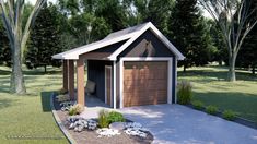 a small house with a garage in the middle of some grass and trees behind it