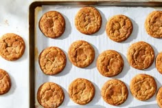 freshly baked cookies on a baking sheet ready to be cooked in the oven for consumption