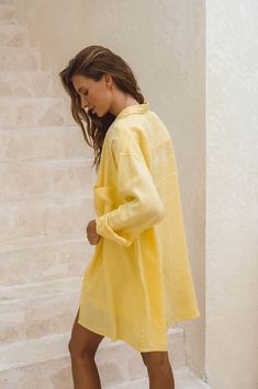 Relaxed oversized tailoring at its best! Crafted from super soft, light-weight 100% French flax linen, this throw-on shirt-dress in warm hues will be your go-to this summer. Thanks to the cooling characteristics of linen, you will feel breezy and luxurious even in warm climates. And it has so many ways to style it! Elevate your wardrobe by layering it over your favourite staples or swimmers, combine it with our matching SUMMER Shorts and style it with your favourite golden jewellery. Take this a Summer Button-up Linen Dress, Chic Button-up Linen Dress For The Beach, Beach Button-up Linen Dress, Casual Linen V-neck Shirt Dress, Relaxed Fit Linen Button-up Shirt Dress, Oversized Tailoring, Shirt Dress Summer, Compost Bags, Hair Wear