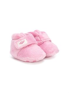 Pink artificial fur touch strap fastening boots from UGG Kids featuring a round toe and a flat sole. | Ugg Kids Touch Strap Fastening Boots Baby Products Newborn, Baby Doll Nursery, Ugg Kids, Pink Uggs, Toddler Wearing, Fashionable Snow Boots, Designer Baby, Burberry Kids, Dolce And Gabbana Kids