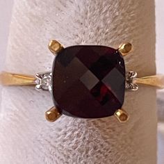 Fine 18k Yellow Gold With Genuine Garnet And Diamonds Ring. Size 6.5. Brand New With Tag. Price On The Tag Reflects Pricing In 1995. Classic Formal Gemstones With Diamond Accents, Formal Yellow Gold Garnet Birthstone Ring, Classic Amethyst Ring With Diamond Accents, Classic Yellow Gold Ruby Ring With Diamond Accents, Classic Amethyst Ring With Diamond Accents, Round Cut, Yellow Gold Ruby Ring With Vs Clarity, Classic Cushion Cut Gemstone For Anniversary, Formal Garnet Diamond Ring With Accent Stones, Classic Garnet Diamond Ring With Center Stone